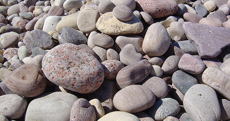 Rounded, cut stones.