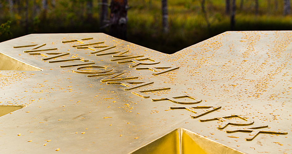 Close-up of the gold star, the symbol of Sweden's national parks.