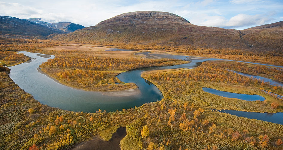 View of the river delta with mountains in the background.