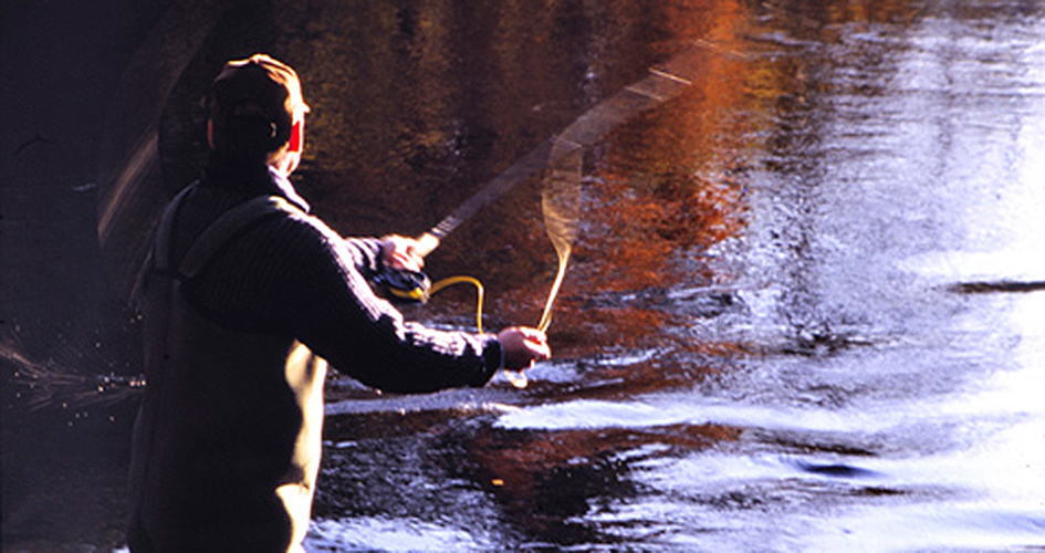 The backboard of a fly fishing person.