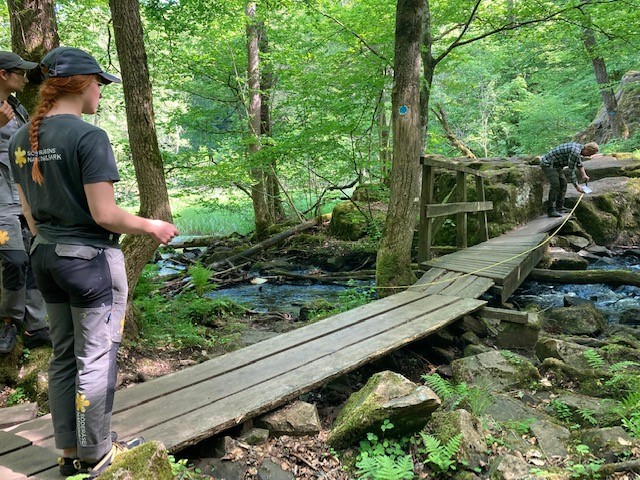 Interns working on a project measuring a ramp